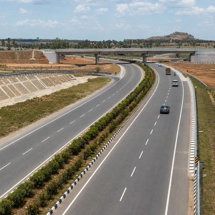 Godrej Plots Malur the Bengaluru—Chennai Expressway, opened 9 December 2024, and its interchange landscape